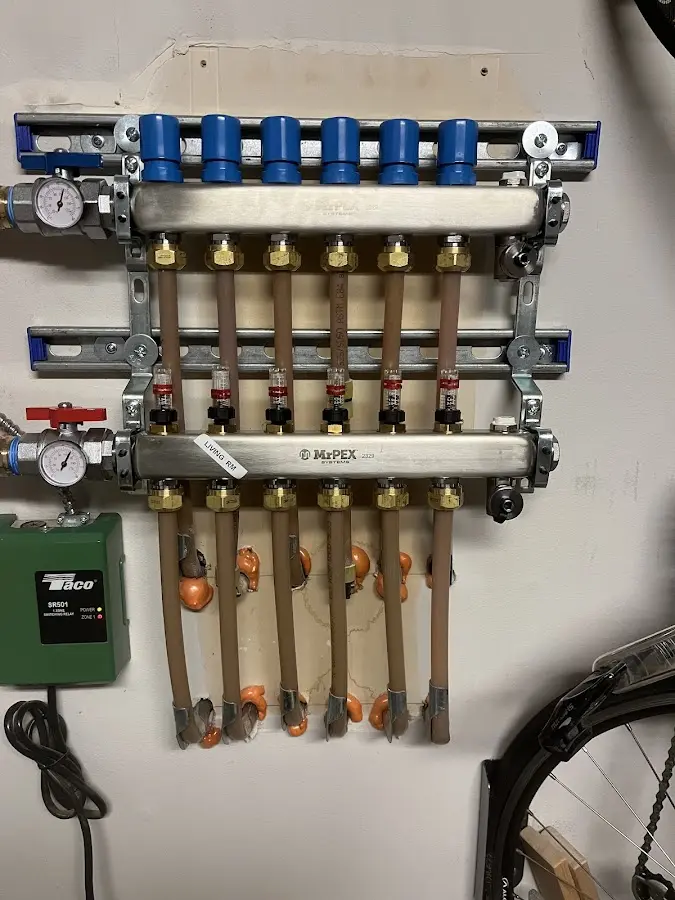 Plumber performing Water Heater Repair at a residential property in Chautauqua